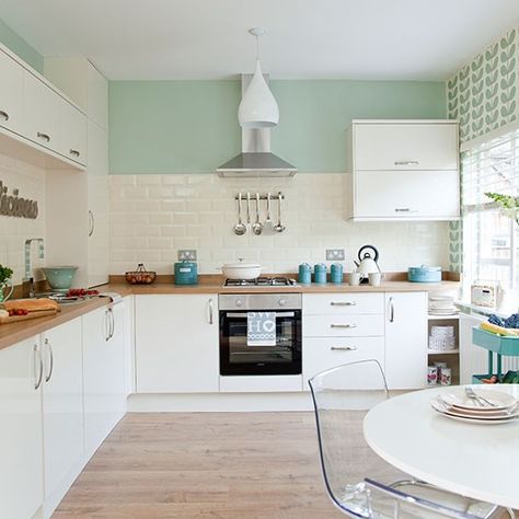 25 Pastel Accent Walls that Will Inspire You to Paint @stylecaster | White kitchen cabinets, white subway tiles, and a pastel blue accent wall Apartemen Studio, Family Area, White Kitchen Design, Kitchen Decorating, Kitchen Diner, Trendy Kitchen, Stylish Kitchen, Green Kitchen, Decor Minimalist