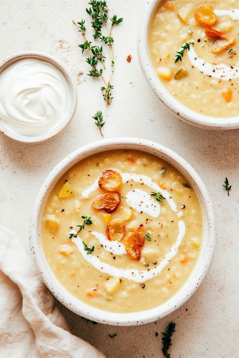 Indulge in the ultimate comfort food with this hearty and delicious vegetarian potato soup. Packed with wholesome ingredients, this soup is perfect for a cozy night in or as a crowd-pleasing dish for your next gathering. With its rich flavors and creamy texture, this soup will surely become a family favorite. Whether you're a vegetarian looking for a satisfying meal or simply craving a flavorful bowl of goodness, this potato soup is sure to hit the spot. Vegetarian Baked Potato, Vegetarian Potato Soup, Potato Soup Vegetarian, Soup Lovers, Smoked Cheese, Baked Potato Soup, Potato Soup Recipe, Garlic Fries, Cozy Meals