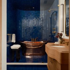 Williamsburg Townhouse - Bathroom Navy Bathroom Tile, Townhouse Bathroom, Navy Bathroom, Tiled Bathroom, Arch Digest, Home Studios, Copper Tub, Burst Of Color, Fire Pit Seating