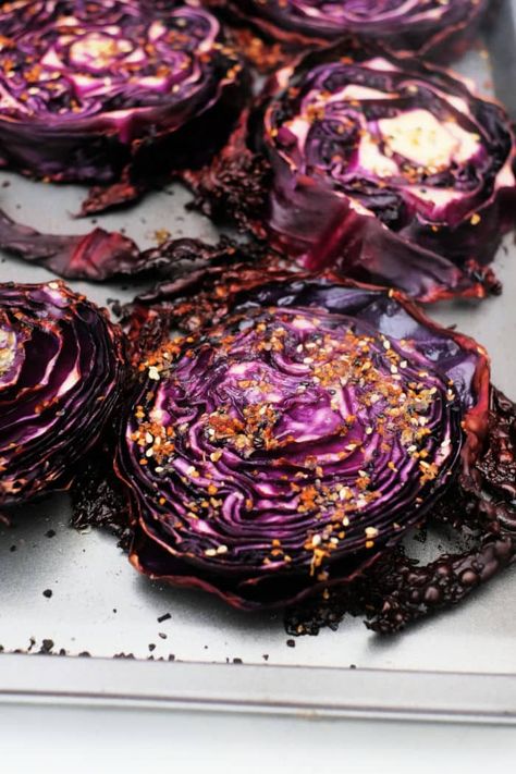 Our easy roasted red cabbage recipe baked in the oven is a low carb side dish we love. Red cabbage steaks buttered and crispy on the edges. Roasted Red Cabbage Steaks, Purple Cabbage Steaks In Oven, Baked Red Cabbage Recipes, Grilled Red Cabbage, Fried Red Cabbage Recipes, Roasted Red Cabbage Recipes, Banana Bread With Mayonnaise, Cabbage Steaks In Oven, Purple Cabbage Recipe