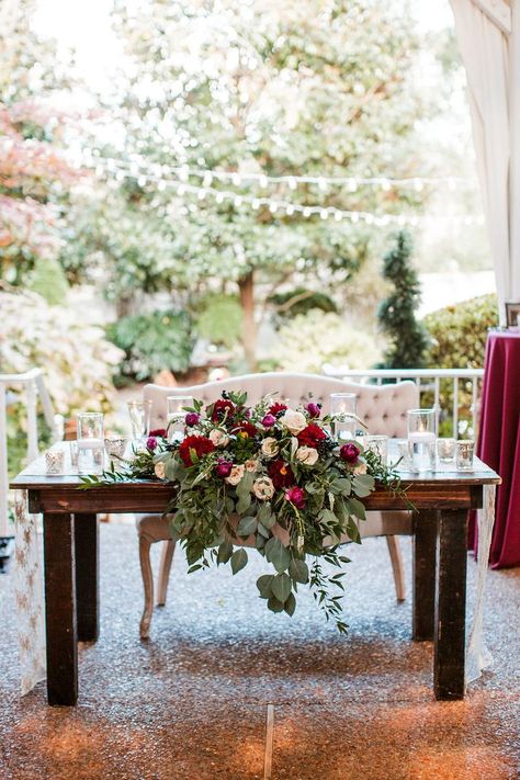 Burgundy Sweetheart Table Flowers, Burgundy Sweetheart Table, Fall Sweetheart Table Wedding, Sweetheart Table Wedding Flowers, Fall Wedding Sweetheart Table, Sweetheart Table Floral Arrangement, Sweetheart Table Arrangement, Sweetheart Table Florals, Sweetheart Table Candles