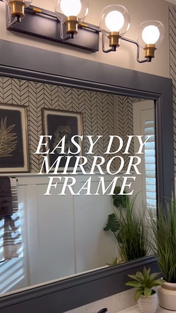 Marian Holden on Instagram: "I’ve done this simple DIY mirror frame in many homes over the years. It is such a simple way to upgrade a builder mirror.

It is also super affordable. I just ust used a 6” baseboard molding. Make sure you paint or stain the back side of the frame as well. You will see that in the mirror if you don’t. And using extreme mount tape is a mess free way to mount the frame. And yes, it sticks really well.

#designerstouch #mirrorframe #diyhomedecor #diyprojects #bathroommakeover" Easy House Updates Diy Projects, Mirror Border Diy, Master Bath Mirror, Diy Mirror Frame, Bathroom Mirrors Diy, Baseboard Molding, Ala Moana, Bathroom Mirror Frame, Mirror Frame Diy