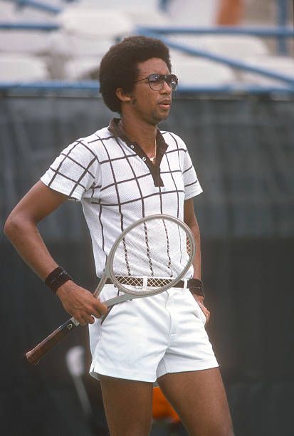 Arthur Ashe Photos and Premium High Res Pictures 70s Tennis Outfit Men, Tennis Outfit Men Vintage, Men’s Tennis Outfit, Tennis Outfits Men, Vintage Tennis Outfit, 80s Sports Fashion, Tennis Field, Vintage Athletic Wear, Walter Johnson