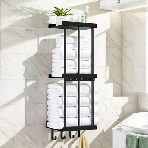 PRICES MAY VARY. Our towel rack wall features 3 shelves designed with middle metal plate divider, classify to store towels of different sizes separately, offer more supports, will not collapse or fall down keep it tidy and easy to access. Our bathroom towel holder size:12" x 32" ,7.67 inch enough depth from the wall; 4 towel hooks for hanging washcloths, clothes, bath balls, etc The top shelf create more storage space, and can store small items or towel. Space saving "TOWELS" Logo on this bath t Bath Towel Hanging Ideas, Small Bathroom Towel Storage Ideas, Rolled Towels Bathroom, Rolled Bath Towels, Towel Storage For Small Bathroom, Guess Bathroom, Bathroom Towel Storage Ideas, Wall Towel Rack, Storage For Towels