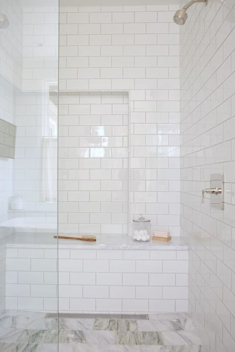 white subway tile trend Classic Bathroom Tile, White Shower Tile, White Subway Tile Shower, White Subway Tile Bathroom, Subway Tile Design, Best Bathroom Flooring, White Tile Shower, Beveled Subway Tile, Subway Tile Showers