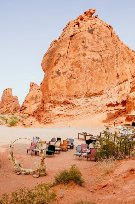 Mixed upholstered chair seating at desert wedding venue with circle pampas grass arch - mix of colors and styles of chairs from pink and orange to blue and purple, wood and metal. Pampas Grass Arch, Scenic Wedding, Valley Of Fire, Upholstered Chair, Outside Wedding, Desert Wedding, Lace Weddings, Pampas Grass, Upholstered Chairs