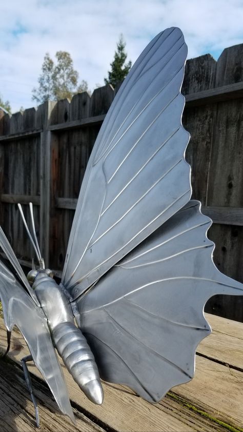 Malachite butterfly sculpture. 40 inch wingspan. Designed, hammered out of stainless steel by artist Steve Nielsen. Check out the other photos on this board showing the painted version of this sculpture. Metal Wire Sculpture, Malachite Butterfly, Metal Butterflies, Butterfly Sculpture, 3d Butterfly Wall Art, Alice In Wonderland Room, Lawn Art, Welding Art Projects, Metal Butterfly