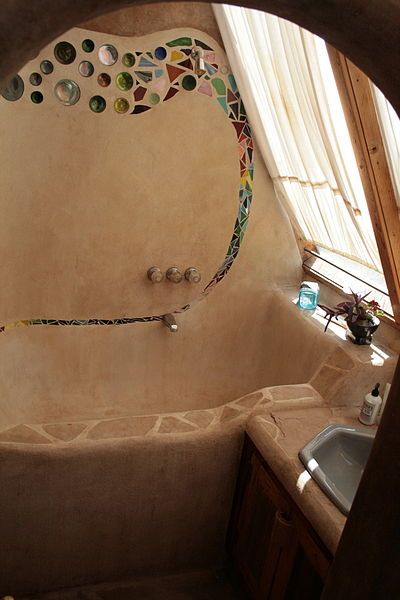 The Bathroom. I love the windows over the tub, and the light that would reflect on the tile Casa Hobbit, Earthship Home, Natural Homes, Casa Country, Bottle Wall, Cob House, Earth Homes, Natural Building, Earthship