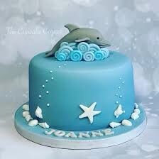 Blue water and dolphins swimming Dolphin Theme Cake, Dolphin Birthday Party Ideas, Dolphin Cake Ideas, Dolphins Cake, Dolphin Birthday Party, Dolphin Birthday Cakes, Dolphin Cake, Dolphin Birthday Parties, Swimming Cake