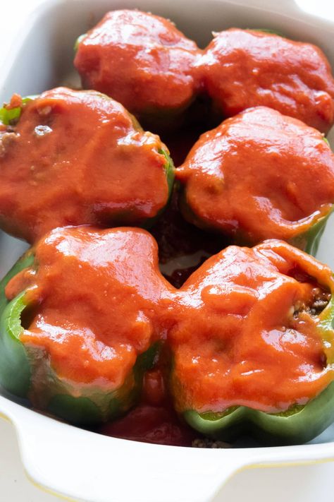 Easy baked stuffed peppers recipe using green bell peppers, ground beef, tomato soup, rice, and mozzarella cheese. Stuffed Peppers Using Tomato Soup, Stuffed Green Peppers With Tomato Soup, Tomato Soup Stuffed Peppers, Stuffed Peppers Tomato Soup, Stuffed Bell Peppers Tomato Soup, Stuffed Peppers With Tomato Soup, Stuffed Bell Peppers Campbells Tomato Soup, Stuffed Bell Peppers With Tomato Soup, Easy Stuffed Bell Peppers Ground Beef And Rice