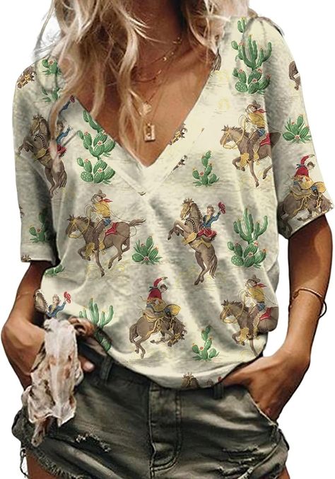 PRICES MAY VARY. Material: Fashionable women's V-neck T-Shirt , 65% polyester fiber, 35% cotton， comfortable and breathable fabric, lightweight and loose, allowing you to stay comfortable all day. Classic styles, including side seams, double needle sleeves, and hem, ensure long-lasting quality Features:Western Cactus Horse T-Shirt, sexy V-neck short sleeves, showcasing your beautiful collarbone and feminine temperament.Vintage Pattern T-Shirt prints paired with a loose and casual style will make Retro Western, Western Tops, Top Wedding Dresses, Casual Summer Tops, Elegant Blouses, Short Sleeve Pattern, Yellow Fashion, T Shirt And Shorts, Retro Stil