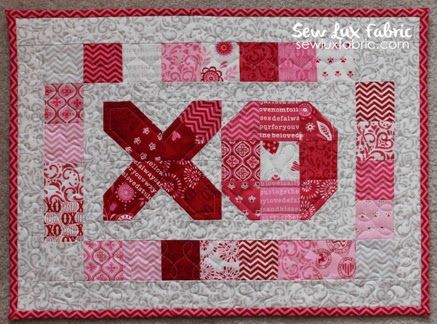 Sew Lux Fabric : Blog: Tutorial : Hugs & Kisses Mini Quilt Valentine Mini Quilts Wall Hangings, Heart Quilt Blocks, Valentines Quilt, Valentines Sewing, Heart Quilt Patterns, Valentine Quilt, Valentine Table Runner, Table Runners Patterns, Valentine Table