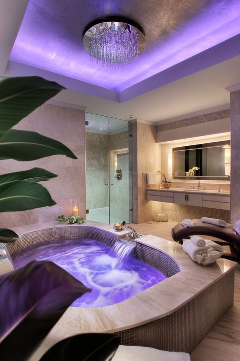 Indulge in the elegance of this modern bathroom design featuring a stunning jacuzzi with soothing purple lighting and a chic chandelier. Perfect for relaxation and rejuvenation. #ModernBathroomIdeas #LuxuriousLiving #HomeDecor Bathroom Ideas Purple, Room With Jacuzzi, Bathroom Interior Design Jacuzzi, Bathroom Interior With Jacuzzi, Bathroom Jacuzzi Tub Ideas, Spa Bath Tub Jacuzzi, Jacuzzi Tub Bathroom, Jacuzzi Tub Bathroom Aesthetic, Jacuzzi Bathroom