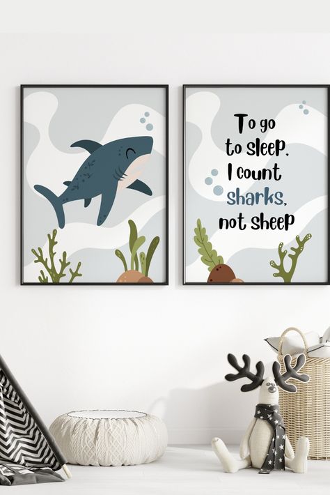 Introducing our adorable "To Go to Sleep, I Count Sharks, Not Sheep" Nursery Print – a playful and enchanting addition to your little one's space. This endearing print is designed to infuse bedtime with a touch of underwater magic, setting the stage for sweet dreams filled with a friendly shark.Elevate your nursery decor with the whimsy of counting sharks instead of sheep. Nurture your child's imagination and make bedtime a joyful adventure. Shark Nursery Theme, Shark Nursery Decor, Shark Wall Art, Shark Nursery, Shark Poster, Sheep Nursery, Nursery Baby Boy, Ocean Themed Nursery, Shark Art