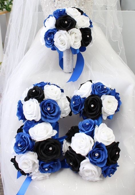 "Build your wedding package {Product description} Color theme: Royal Blue, Black, White, Silver Flowers: Artificial Roses {Bouquets} A. Bridal Bouquet: DIA 10\" x 11\" B. 9\" Round bouquet C. 8\" Round bouquet {Corsage} Pin-on style Writs corsage {Boutonniere} As pictured. Ribbon wrapped stem with bling accent Pearl-headed Pin included" Black N Blue Wedding, Royal Blue And Black Wedding Ideas, Blue Black And White Wedding Theme, Black Blue White Wedding, Royal Blue Black And Silver Wedding, Black White And Royal Blue Wedding Decor, Royal Blue Black And White Wedding, Royal Blue Black And Silver Decorations, Light Blue And Black Wedding Theme