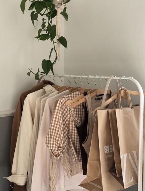 clothes hanging rack, college apartment decor, cozy house, cozy bedroom, cozy room decor, college dorm room ideas, college apartment bedroom, fall decor living room, warm apartment aesthetic, apartment decor, apartment decor ideas, bedroom decor, organization ideas for the home, organizing ideas Clothes In Rack Aesthetic, Rack Clothes Aesthetic, Cloth Rack Aesthetic, Rack Of Clothes Aesthetic, Aesthetic Clothing Rack Bedroom, Closet Rack Aesthetic, Clothes Hanging Aesthetic, Cute Clothes Rack, Clothing Rack Bedroom Aesthetic