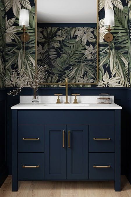 Check out this stunning console vanity, styled with bold wallpaper and an elegant backdrop. Featuring our Interlude design in striking Cobalt blue. Blue Vanity Bathroom Wallpaper, Blue Bathroom Cabinets Vanities, Bold Half Bath, Jewel Box Powder Room, Blue Powder Room Wallpaper, Blue Half Bathroom, Navy Vanity Bathroom Ideas, Bold Powder Room Ideas, Navy Vanity Bathroom