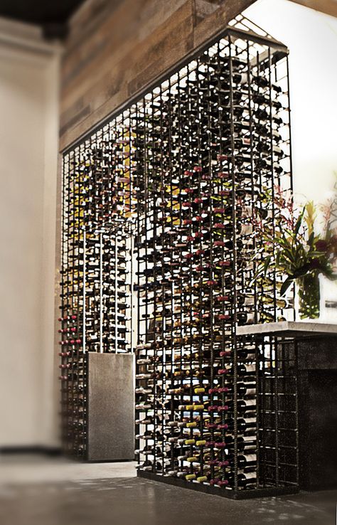 Wine rack constructed with rebar at the Santa Monica restaurant Tar & Roses. Cave A Vin Design, Sliding Room Dividers, Modern Room Divider, Home Wine Cellars, Wine Cellar Design, Hotel Lounge, Cellar Design, Wine Wall, Wine Display