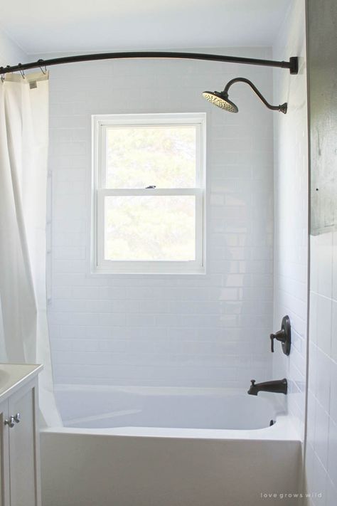 This tub and shower gets a total transformation! See how @BathFitter gave this old farmhouse bathroom a fresh, new look. (via LoveGrowsWild.com) #GetBathFitted #ad Small Bathroom With Window, Bathroom Windows In Shower, Bath Fitter, Bathtub Surround, Mold In Bathroom, Window In Shower, Bathtub Tile, Bathtub Remodel, Shower Installation