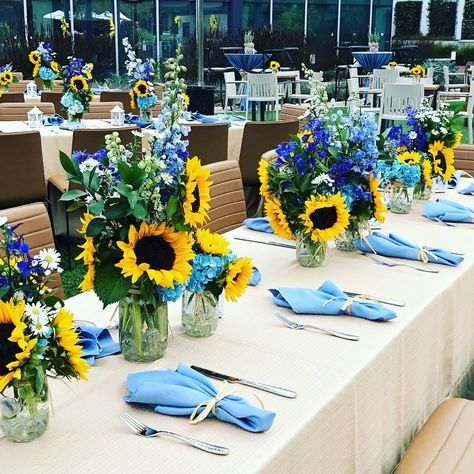 Blue And Yellow Wedding Table Decor, Dusty Blue And Sunflower Wedding Centerpieces, Yellow And Blue Wedding Decorations, Royal Blue And Yellow Wedding, Yellow And Navy Wedding, Sunflower Party Themes, Yellow And Blue Wedding, Bbq Baby Shower Decorations, Sunflower Wedding Centerpieces