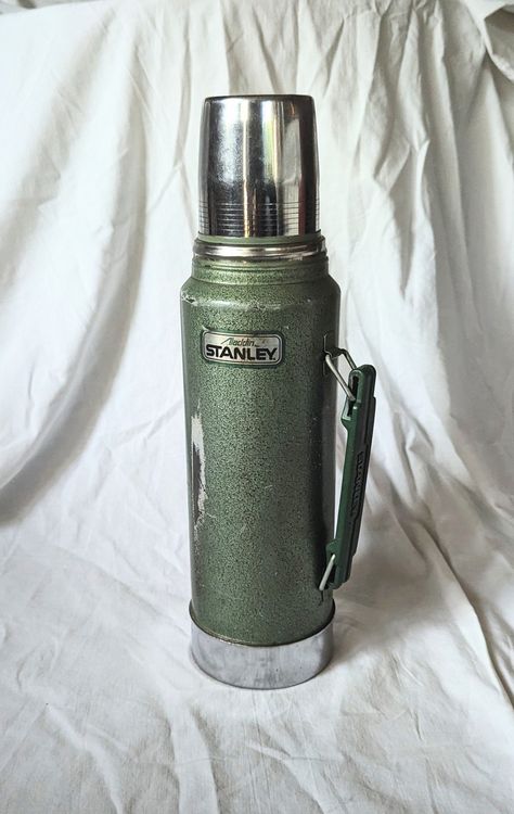 Distressed, vintage thermos bottle  Has cup and pour stopper Vintage Stanley Thermos, Vintage Water Bottle, Vintage Toys 1960's 1950s, Stanley Thermos, Baby Boomers Memories, 57 Chevy Trucks, Vintage Lampshades, Vintage Toys 1960s, Tea Club