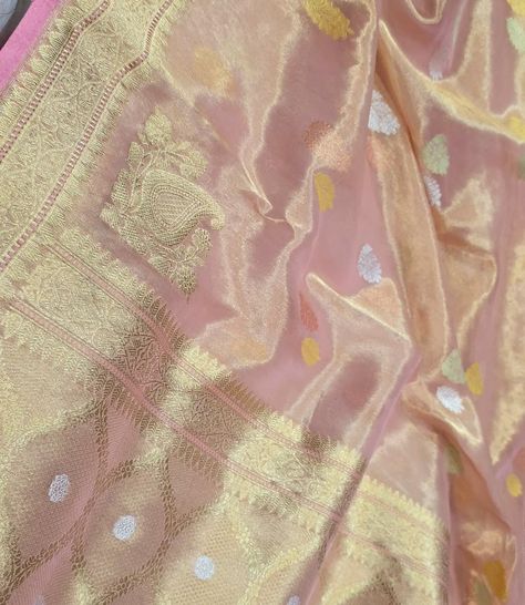 *Special offer price :13500+$ only** Premium quality vintage revival banarasi handwoven kora tissue silk saree with rupa sona and multi minakaari kadhva butis all over with konya motifs, beautifully handwoven on double zari, super soft and flowy kora tissue . *Saree value: 22500rs* *(Note: saree has some nominal zari work faults which is not visible and at the end of the saree which goes in plates as shown in the vedio)* Tissue Silk Saree, Tissue Saree, Vintage Revival, Zari Work, Silk Saree, Special Offer, Silk Sarees, The End, Premium Quality