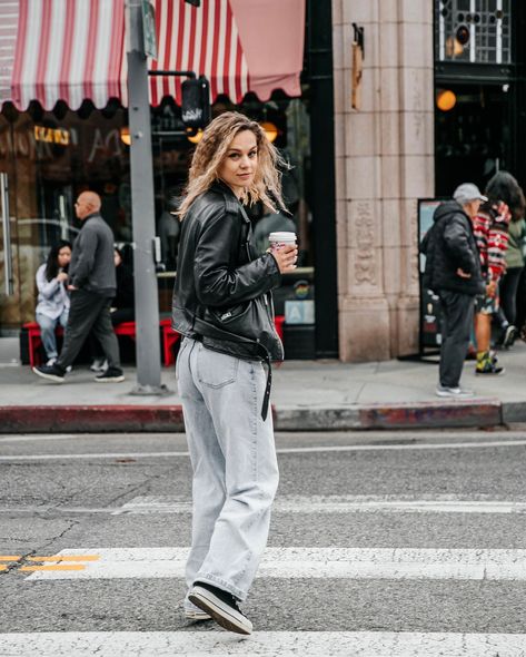 A photo capturing a curly-haired blonde woman styled in casual street fashion on Abbot Kinney Boulevard in Los Angeles. She wears a stylish leather jacket over a simple top, paired with classic jeans. The setting features the bustling street vibe typical of this fashionable LA district. La Photoshoot, Street Style Photoshoot, Abbot Kinney Blvd, Abbot Kinney, Leather Jeans, La Fashion, Fashion Photoshoot, All Saints, Curly Blonde