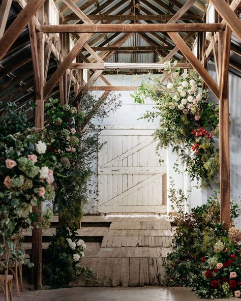 We don’t often get to host winter weddings, but we absolutely love them! This moody winter wedding, styled by @weddingsofdesire, was an absolute delight. The shearing shed at @barunahplains was transformed with an abundance of foliage, vines, and winter blooms, including peonies, autumnal hydrangeas, poppies, roses, tulips, and hyacinths. The rich palette of burnt orange, burgundy, brown, taupe, yellow, and soft pinks created an epic ceremony installation. The reception, held in a marquee, se... Ceremony Installation, Moody Winter Wedding, Shearing Shed, Winter Blooms, Classic Brides, Moody Wedding, Melbourne Wedding, Floral Backdrop, Winter Weddings