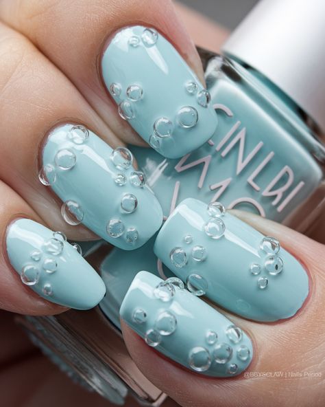 🌈✨ Dive into a world of dreamy pastels with our bubble-themed nail polish designs! Each delicate shade of soft blue captures the playful essence of floating bubbles, bringing an airy, whimsical touch to your nails. Perfect for those who love to express their artistic side with a splash of charm! 💙💅 #BubbleNails #PastelDreams Pastel Blue Nail Art, Balloon Nails, Jellyfish Nails, Pastel Blue Nails, Floating Bubbles, Bubble Nails, Blue Nail Art, Blue Nail, Nail Polish Designs