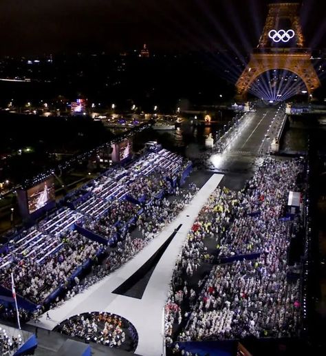 Global music icon Celine Dion made her triumphant return to the stage at the 2024 Paris Olympics opening ceremony on Friday, delivering a performance of Edith Piaf's "Hymne à l'amour" to close the ceremony at the Eiffel Tower. Other scenes included French soccer star Zinedine Zidane holding the Olympic flame during the ceremony, and Floriane Issert, a non-commissioned officer for the National Gendarmerie, carrying the Olympic flag. Read more: https://dailymore.com.ng Olympic Flag, Olympic Flame, Soccer Star, Olympics Opening Ceremony, Edith Piaf, Paris Olympics, Zinedine Zidane, Soccer Stars, The Eiffel Tower