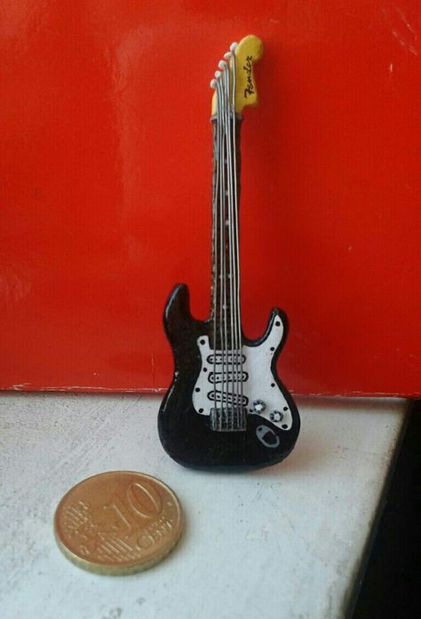 Miniature air dry clay electric guitar Air Dry Clay Guitar, Clay Guitar, Clay Keychain, How To Make Clay, Gift Inspo, Diy Clay Crafts, Clay Ideas, Dry Clay, Diy Clay