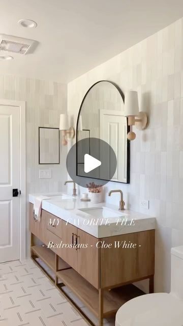 Lisa Kanegae on Instagram: "Cloe white from @bedrosianstile is one of my absolute favorite tiles! It has a beautiful hand made feel and texture. The shimmer on this tile is so gorgeous and I love how each piece feels unique and organic. Do you like hand made looking tiles? < a d >

💫 Working on a remodel? We’d love to help. Tap on the link in my bio to inquire for design services. 

Design by: @lhk.interiors 
.
.
.
#bathroomtiles #zellige #bathroomdesign #bathroomremodel #bathroomrenovation #bathroomdesigns #bathroomtile #bathroom #neutralbathroom #bathroomdecor #showerdoor #idcoathome #mysmphome #smploves #smpliving #theeverygirlathome #riadtile #wearevivir #beckiowensfeature #tuesdaytransformation #interiordesigntips #wear #neutralbathroom" White Zellige Tile Bathroom, Lhk Interiors, Zellige Tile Bathroom, Neutral Bathroom, Becki Owens, Primary Suite, Zellige Tile, Interior Design Tips, Shower Doors