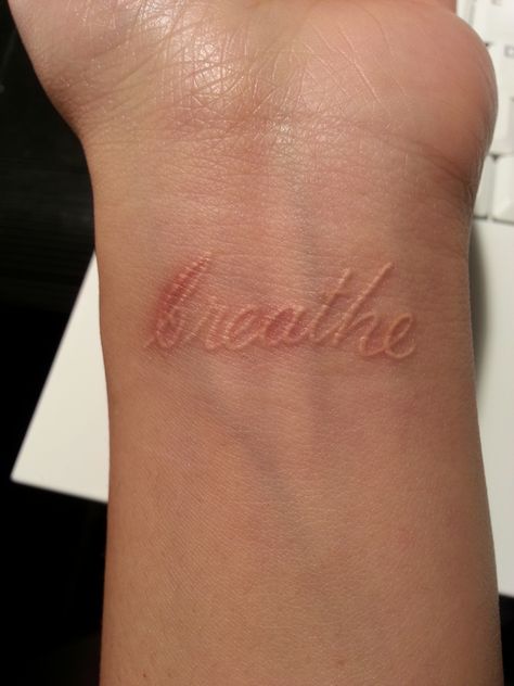 breathe White Tattoo Ideas, Tattoo Ideas Meaningful, Girl Spine Tattoos, Faith Tattoo On Wrist, One Word Tattoos, White Tattoos, Cool Wrist Tattoos, Matching Sister Tattoos, Literary Tattoos