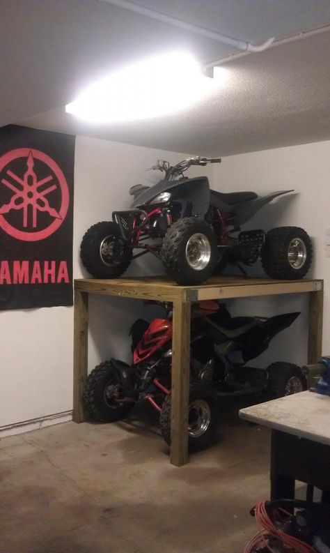 ATV Shelf - Storage - Space issue solved (PICS!) - Yamaha Raptor Forum Four Wheeler Storage Ideas, Dirt Bike Storage, Atv Storage Ideas, Dirt Bike In Garage, 4 Wheeler Rack Ideas, Atv Racks Diy, Dirtbike Tire Shelves, Atv Storage, Big Garage