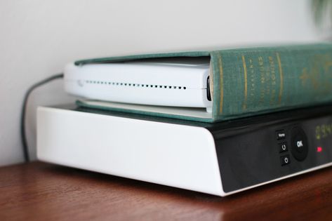 DIY device cover with a book. – Look what I made ...LOOK WHAT I MADE … Hide Router, Stainless Steel Contact Paper, Stainless Steel Paint, Interlocking Deck Tiles, Storing Craft Supplies, Look What I Made, Supplies Organization, Hidden Storage, Travel Planner