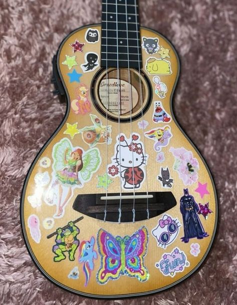 Acoustic Guitar Decoration, Decorated Guitars Stickers, Guitar With Stickers Aesthetic, Decorated Ukulele, Decorated Guitar, Ukulele Stickers, Guitar Decorations, Ukulele Design, Pjo Dr