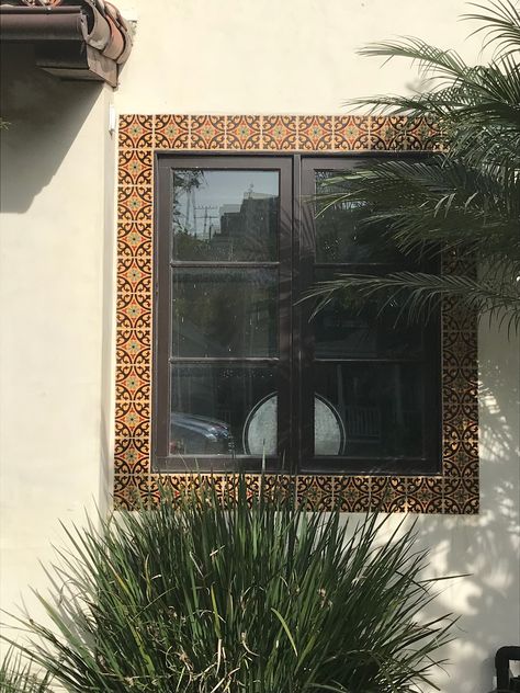 Nice way to use ornate tile around a window instead of a traditional window frame.  #tile #window #windowframe #homeideas Tile Around Door Frame, Tiles Around Window, Tile Door Frame, Tile Window Trim, Spanish Style Windows Exterior, Mexican Tile Window Trim, Hacienda Windows Mexican Style, Tile Around Window, Spanish Colonial Windows