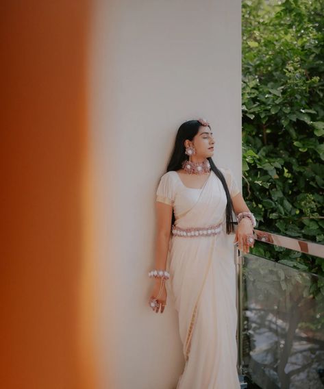 Under the watchful eyes of tradition and the golden touch of turmeric, the couple is showered with blessings. The Haldi ceremony is a beautiful fusion of love, heritage, and divine protection, marking the start of a journey that honors the sanctity of marriage and the timeless beauty of our culture. Photography by @megamindproduction Bride: @dk_harshu Groom: @dilipkumar_d_krishna Enquries on +91-9513373111 . . . . [ megamindproductions, photography, photographersbangalore, conceptphotograp... Traditional Wedding Decor, White Saree, Haldi Ceremony, Women Photography Poses, Indian Wedding Decorations, Candid Photography, Timeless Beauty, Photography Poses, Wedding Hairstyles