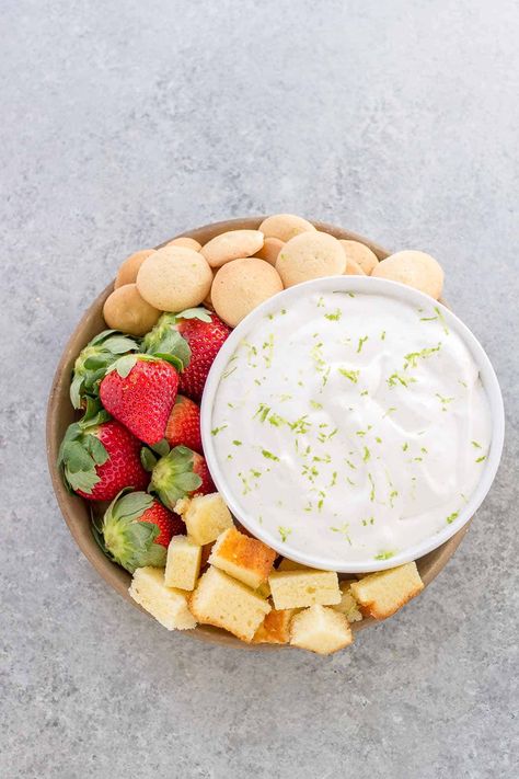 With only 4 ingredients and the same amazing taste and tang you love from the classic pie, this Key Lime Pie Dip will send you straight into summertime bliss! Key Lime Pie Dip, Key Lime Pie Cheesecake, Strawberry Blondie, Mini Key Lime Pies, Seafood Party, Pie Dip, 60th Bday, Key Lime Juice, 12 Tomatoes