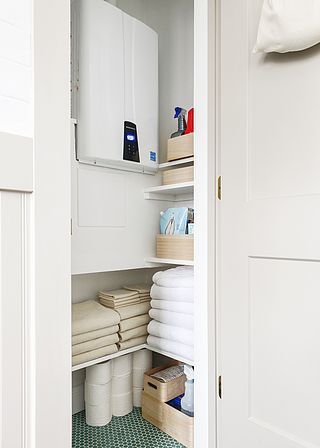 Over Heater Storage, Hot Water Heater Closet Storage, Boiler Cupboard Storage, Closet Organization For Renters, Water Heater Closet Storage, Water Heater In Bathroom, Bedroom Cupboard Storage Ideas, Diy Dining Banquette, Hot Water Heater Closet