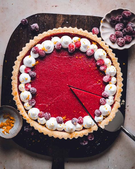 Dazzle your guests with a Cranberry Curd Tart this holiday! 🎉🥧 Its crisp, nutty crust and zesty filling offer a fresh twist on classic flavors (and is naturally gluten free!). Prep ahead and serve a dessert that perfectly caps off any festive meal with convenience and style. Cranberry Curd Tart With Hazelnut Crust, Cranberry Custard Pie, Gluten Free Tart Crust, Cranberry Tart Recipe, Cranberry Curd Tart, Cranberry Curd, Curd Tart, Easy Homemade Desserts, Cranberry Tart