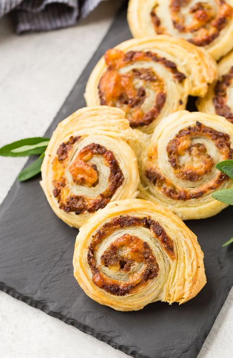 These beautiful sausage pinwheels are the perfect fall appetizer with flavors of apple, sage, and Gruyère. They're irresistible! Sausage Pinwheels, Sausage Puffs, Puff Pastry Pinwheels, Fall Appetizer, Fall Appetizers, Sage Sausage, Easy Puff Pastry, Apple Sausage, Pinwheel Recipes