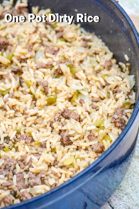 This recipe for a one pot dirty rice is a staple on our family meal plan. It’s a quick, easy way to dress up dinner featuring several ingredients typically always in the pantry- like ground beef, sauteed onions, green peppers, and (of course) Creole seasoning. #dirtyrice #dirtyricerecipe #siderecipe Crockpot Dip, Rice Sides, Family Meal Plan, Dirty Rice Recipe, Sauteed Onions, Dirty Rice, One Pot Wonders, Rice Side Dishes, Family Meal Planning