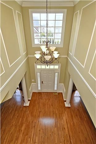 Two story Foyer of home with shadow boxes Stairway Paint Colors, Foyer With Stairs, Foyer Wall Decor, Foyer Ideas Entryway, Foyer Wall, Two Story Foyer, Foyer Decor, Foyer Decorating, Foyer Design