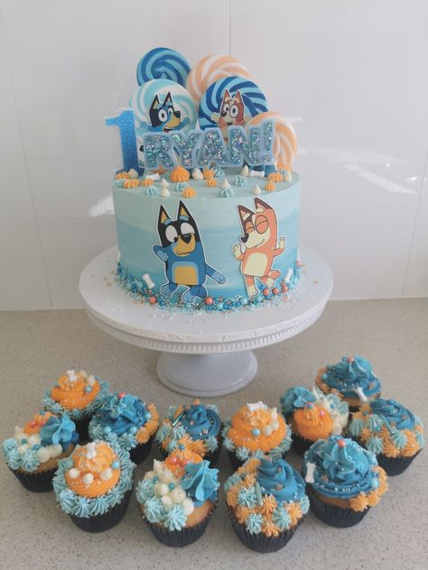 Bluey Cake With Cupcakes, Number 1 Bluey Cake, Bluey Birthday Cupcake Cake, Bluey Themed Smash Cake, Bluey Cake Birthday, Bluey Cake And Cupcakes, Bluey Cupcakes Boy, Bluey Birthday Party Cupcakes, Bluey Bingo Cupcakes