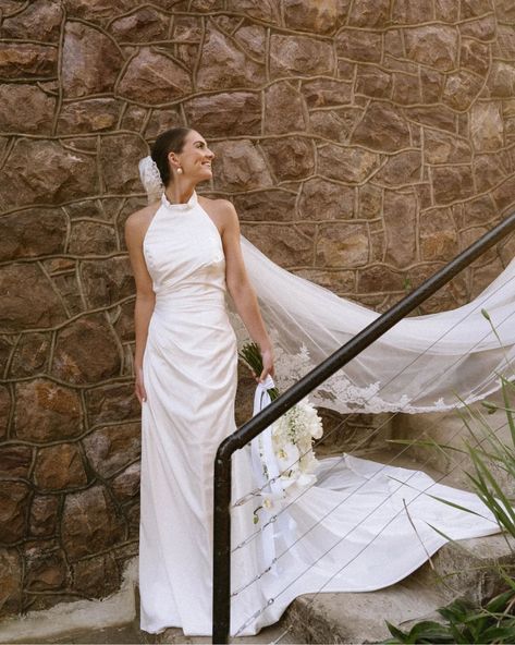 Draped luxury ✨️ How gorgeous are these photos by @skyekyraphotography from a recent styled shoot! This halter neck wedding dress, featuring a hand drapped bodice and skirt, with a low open back and tie detail at the waist. Made from luxurious silky satin, it hangs effortlessly. Perfect for your effortlessly chic aesthetic! Paired with this achrival veil from @veil_atelier and some stunning earrings from @olivecoral. The ever so talented @kiss.the.bride.hair.makeup did this absolutely fl... Halter Neck Wedding Dress With Veil, Halter Neck Wedding Dress, Dress With Veil, Kiss The Bride, Halter Wedding, Halter Wedding Dress, Neck Wedding Dress, Wedding Dress With Veil, Chic Aesthetic