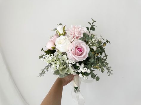 Blush & Greenery Bridal Bouquet 12" Artificial/ Pastel Pink Bouquet / Pink Wedding Bouquet / Rustic Eucalyptus Bouquet/ Dusty Rose Bouquet Bridal bouquet shown measures approximately 12 inches wide. Maid of honor and bridesmaid bouquets measure respectively 9 and 7 inches across. I am using the top quality silk flower and eucalyptus on my work, that the bouquet looks very realistic and stunning.  Coordinating boutonnieres and corsages are available. If you need any matching archway, swag and tieback, garland, cake topper, centerpieces or hairpieces, please message me for a quote.  Tailor made service are available, please send me your ideas for a quote. Sage Green Dusty Rose Wedding Bouquet, Bridesmaid Bouquet Light Pink, Simple Pink Wedding Bouquet, Simple Wedding Bouquet Summer, Bridesmaid Bouquets Simple, Pink Wedding Bouquet Ideas, Bridesmaid Flower Bouquets, Pastel Pink Bouquet, Pink And White Rose Bouquet