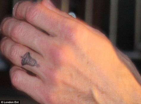 Dax Shepard debuts Kristen Bell tattoo at This Is Where I Leave ... Small Bell Tattoo, Bell Tattoo Ideas Simple, Bell Tattoo Ideas, Bells Tattoo, Amber Tattoo, Bell Tattoo, Tattoo On Finger, Dax Shepard, Matching Sister Tattoos