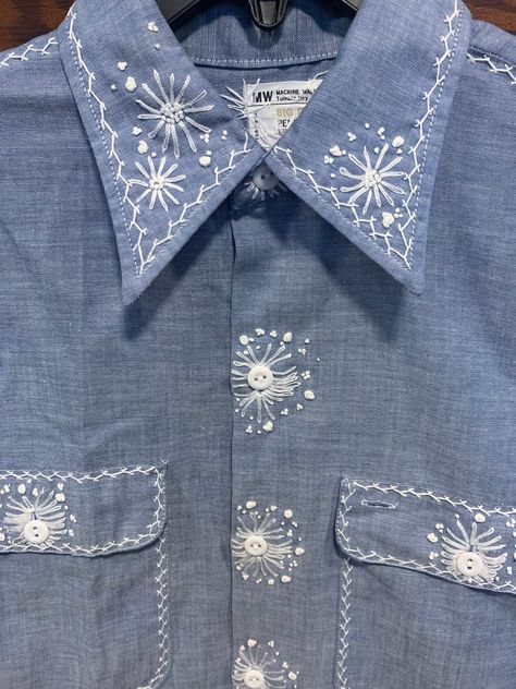 true vintage 1970s denim shirt. Gorgeous hand stitching on front, back and sides of this easywear button down soft poly and cotton denim shirt. No sizing tags but fits like a large. One of a kind in great condition. CUTE white dandelions. Make a wish! 1970's style Denim Shirt Embroidery, Embroidered Denim Shirt, Cotton Blouse Design, Denim Embroidery, 2024 Ideas, Embroidered Shirts, Embellished Shirt, Embroidery Shirt, Denim Shirts