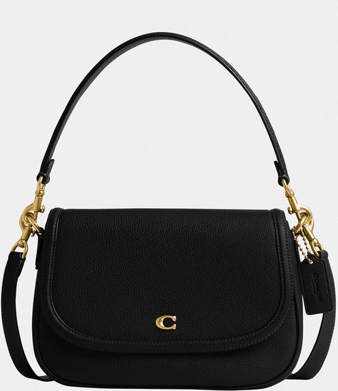 From COACH, the Legacy Small Pebbled Leather Shoulder Bag features: Featuring a COACH logo flap, this Legacy shoulder bag sits just beneath the underarm with the shorter strap or it can be worn as a crossbody. Small sized bag; 10"W x 7-.25"H x 2-.75"D (width is measured across the bottom of handbag); 1.32 lbs. approx. weightApprox. 7-.5" L removable short strap; 21-.5" L r Coach Bags Crossbody Black, Coach Shoulder Purse, Coach Top Handle Bag, Black Coach Shoulder Bag, Coach Purse Aesthetic, Coach Bags Aesthetic, Coach Swinger Bag, Black Sling Bag, Crossbody Coach